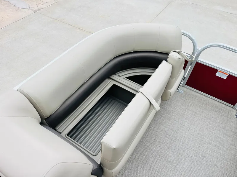 Slide: The Image of 2025 Sun Tracker Party Barge 18 DLX pontoon seating with storage compartment. - 17