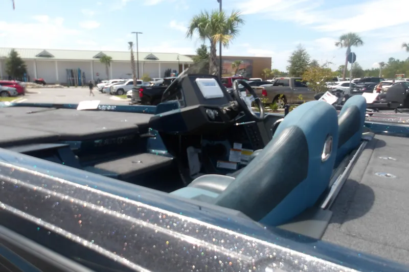 Slide: The Image of 2025 Ranger Z518 Cup-Equipped boat interior with dual seats and control panel. - 3