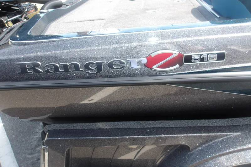 Slide: The Image of 2025 Ranger Z518 Cup-Equipped boat logo on a sleek, metallic surface. - 11