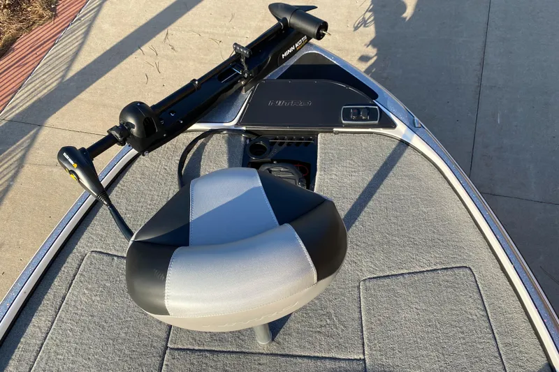 Slide: The Image of 2025 Nitro Z18 boat deck with seat and trolling motor. - 3