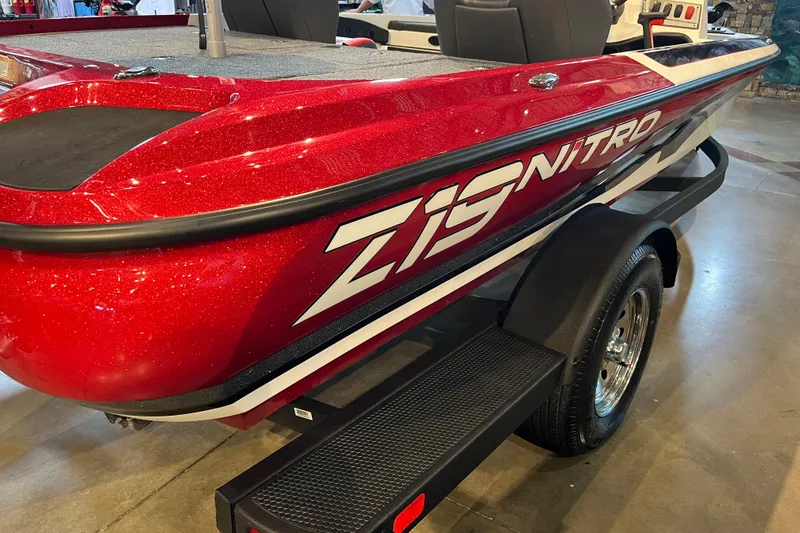 Slide: The Image of Red 2025 Nitro Z19 boat on display, featuring sleek design and bold graphics. - 1