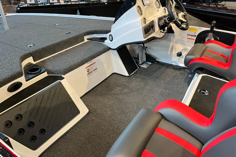 Slide: The Image of 2025 Nitro Z19 boat interior with modern dashboard and comfortable seating. - 4