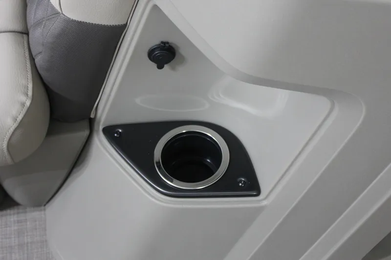 Slide: The Image of 2025 Sun Tracker Party Barge 20 DLX cup holder and seat detail. - 10