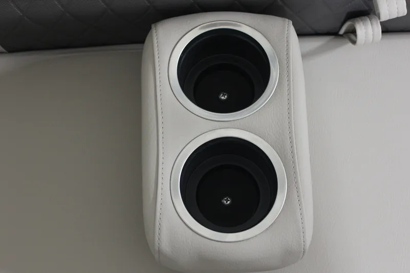 Slide: The Image of Cup holders on 2025 Sun Tracker Party Barge 20 DLX boat, featuring sleek design. - 20