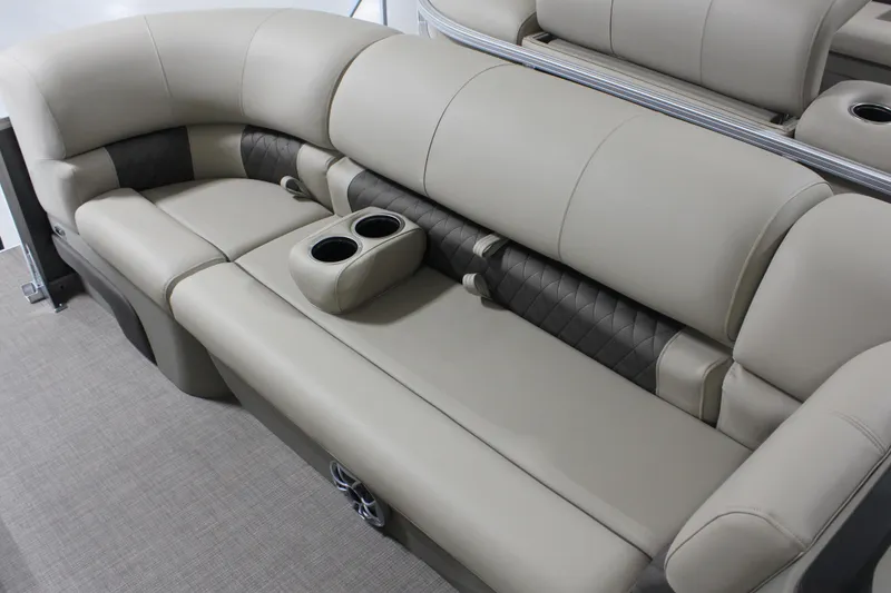 Slide: The Image of 2025 Sun Tracker Party Barge 20 DLX interior seating with cup holders and elegant design. - 3