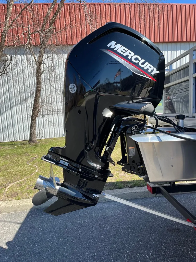 Slide: The Image of 2025 Sun Tracker Fishin' Barge 20 DLX with Mercury outboard motor. - 3