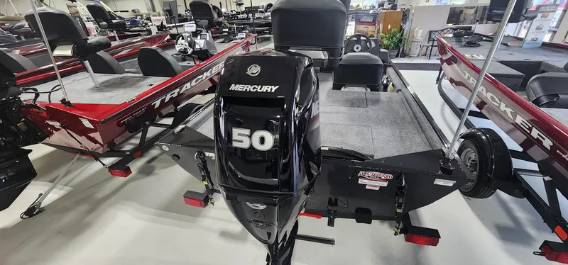 Slide: The Image of 2025 Tracker Bass Tracker Classic XL with Mercury 50 engine in showroom. - 13