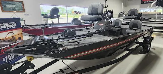 Slide: The Image of 2025 Tracker Bass Tracker Classic XL boat displayed in showroom. - 3