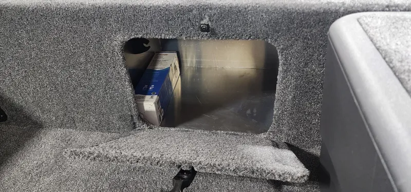 Slide: The Image of Storage compartment in 2025 Tracker Bass Tracker Classic XL boat interior. - 8