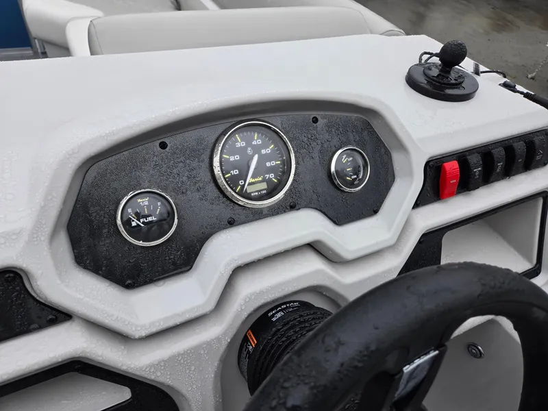 Slide: The Image of Dashboard of 2025 Godfrey Xperience 2286 SFLX boat with gauges and controls. - 12