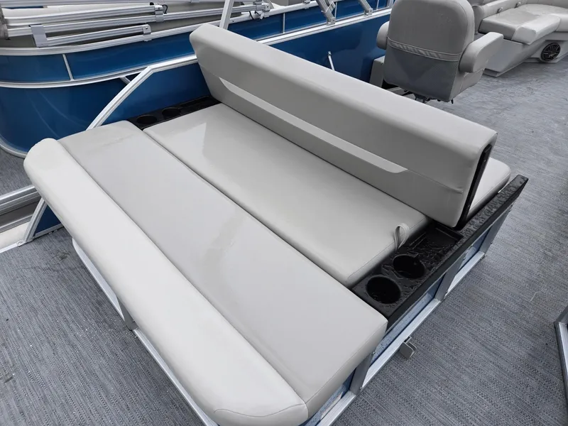 Slide: The Image of 2025 Godfrey Xperience 2286 SFLX boat seating with cup holders, gray upholstery. - 20