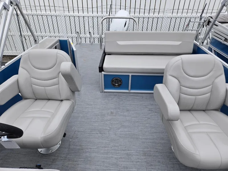 Slide: The Image of 2025 Godfrey Xperience 2286 SFLX boat interior with plush seating and modern design. - 8