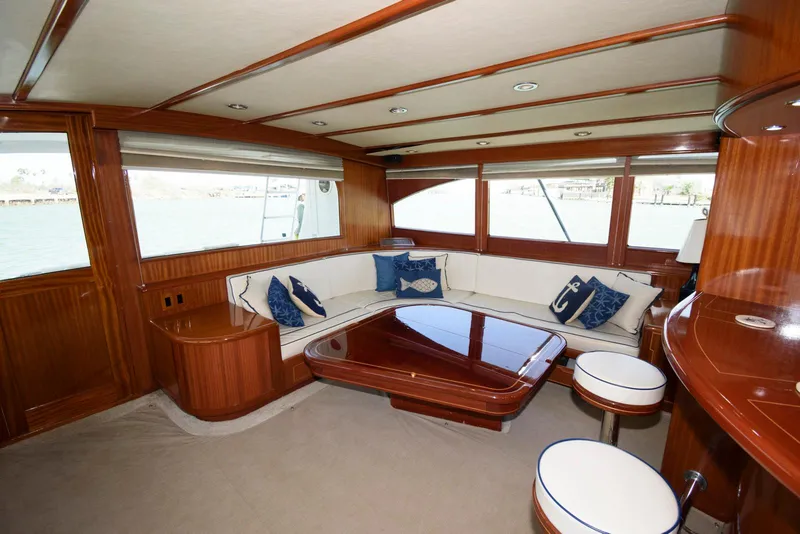 Slide: The Image of Luxurious interior of 1998 Huckins 70 Sportfish Convertible yacht with elegant wood finish. - 38