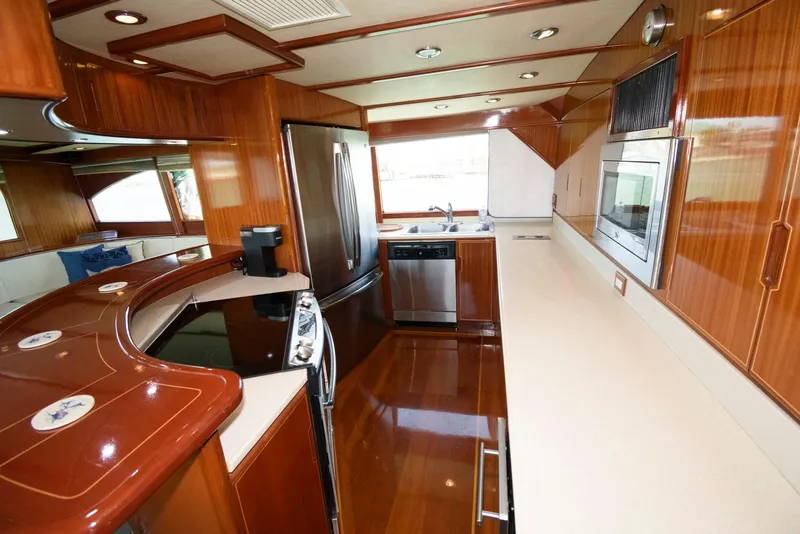 Slide: The Image of Luxurious kitchen interior of 1998 Huckins 70 Sportfish Convertible yacht. - 39