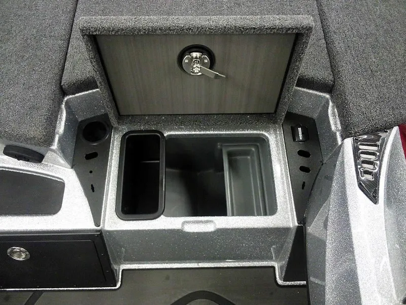 Slide: The Image of 2025 Triton 20XP Patriot boat storage compartment with lockable hatch and organized interior layout. - 11