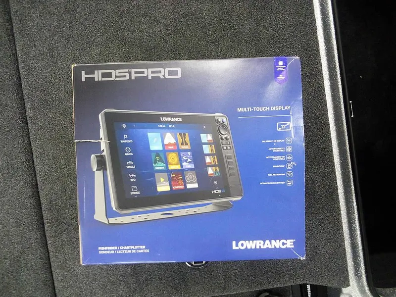 Slide: The Image of Box of Lowrance HDS Pro multi-touch display on Triton 20XP Patriot, 2025 model. - 14