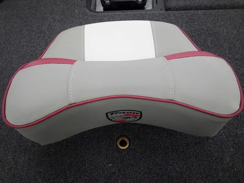 Slide: The Image of Triton 20XP Patriot 2025 boat seat with gray and red design on carpeted floor. - 16