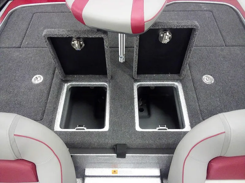 Slide: The Image of 2025 Triton 20XP Patriot boat interior with storage compartments and seating. - 23