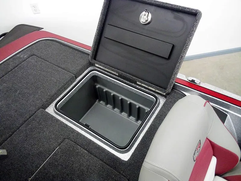 Slide: The Image of Open storage compartment in 2025 Triton 20XP Patriot boat. - 24