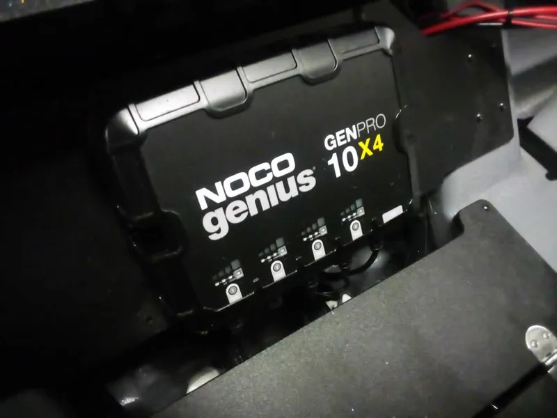 Slide: The Image of NOCO Genius GENPRO 10x4 charger in 2025 Triton 20XP Patriot boat. - 28