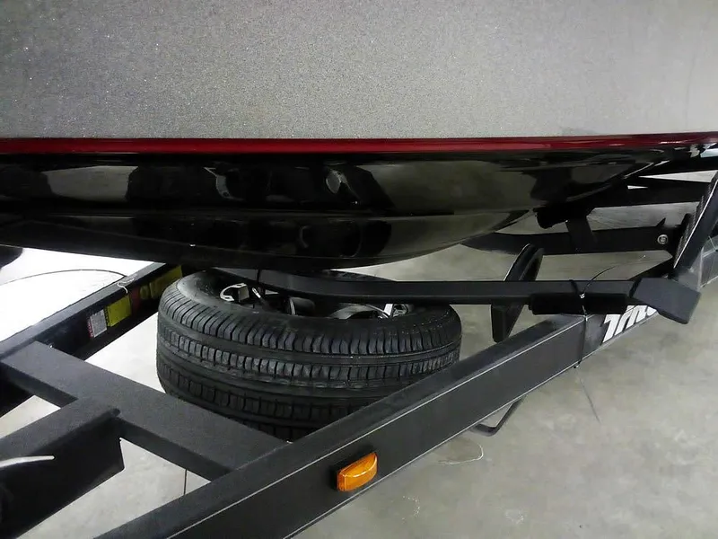 Slide: The Image of 2025 Triton 20XP Patriot boat trailer with spare tire. - 6