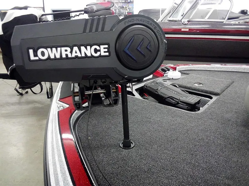 Slide: The Image of Triton 20XP Patriot 2025 boat with Lowrance navigation system on deck. - 8