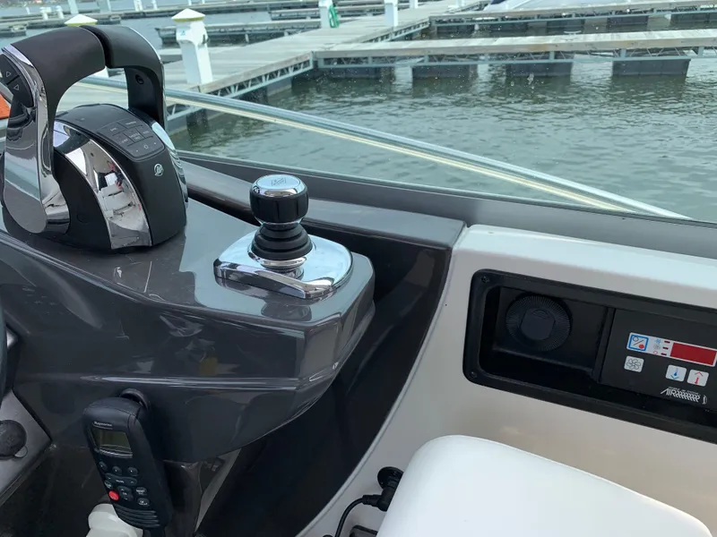 Slide: The Image of Control panel of 2014 Monterey 320 Sport Yacht at marina dock. - 26