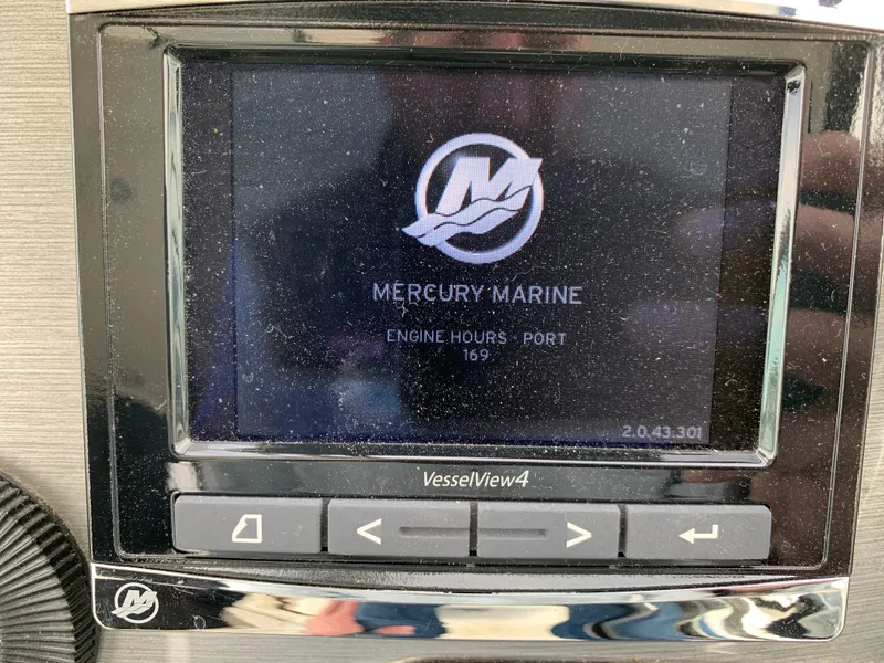 Slide: The Image of Mercury Marine VesselView4 display on 2014 Monterey 320 Sport Yacht showing engine hours. - 30