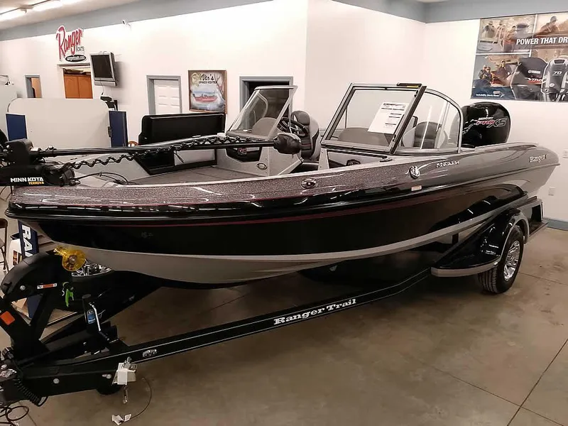 The Image of 2025 Ranger 1880MS Angler boat displayed indoors on a trailer. - 0