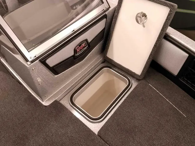 Slide: The Image of 2025 Ranger 1880MS Angler boat interior storage compartment with open lid. - 17