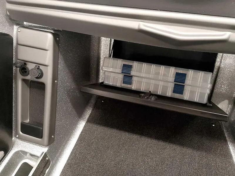 Slide: The Image of Storage compartment in 2025 Ranger 1880MS Angler boat with tackle box. - 23