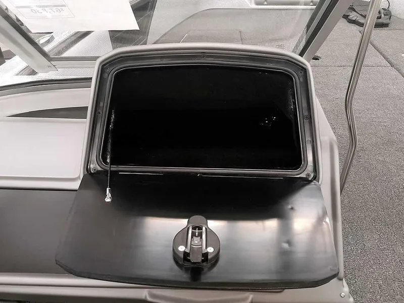 Slide: The Image of Open storage compartment on 2025 Ranger 1880MS Angler boat. - 24