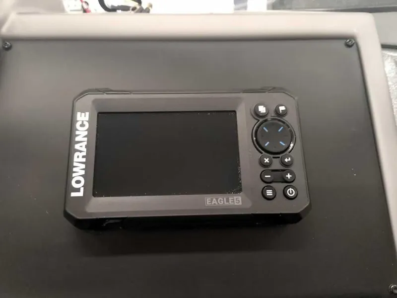 Slide: The Image of Lowrance Eagle 5 fish finder on 2025 Ranger 1880MS Angler boat dashboard. - 27