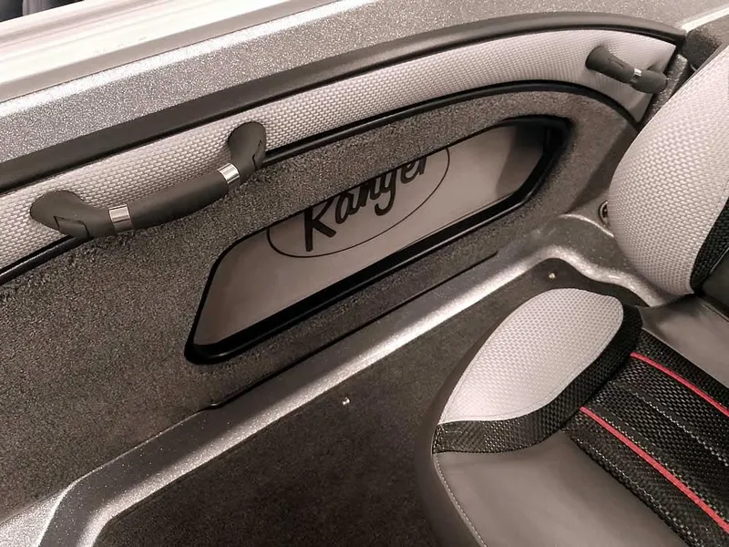 Slide: The Image of Interior of 2025 Ranger 1880MS Angler boat with sleek seating and handle design. - 29