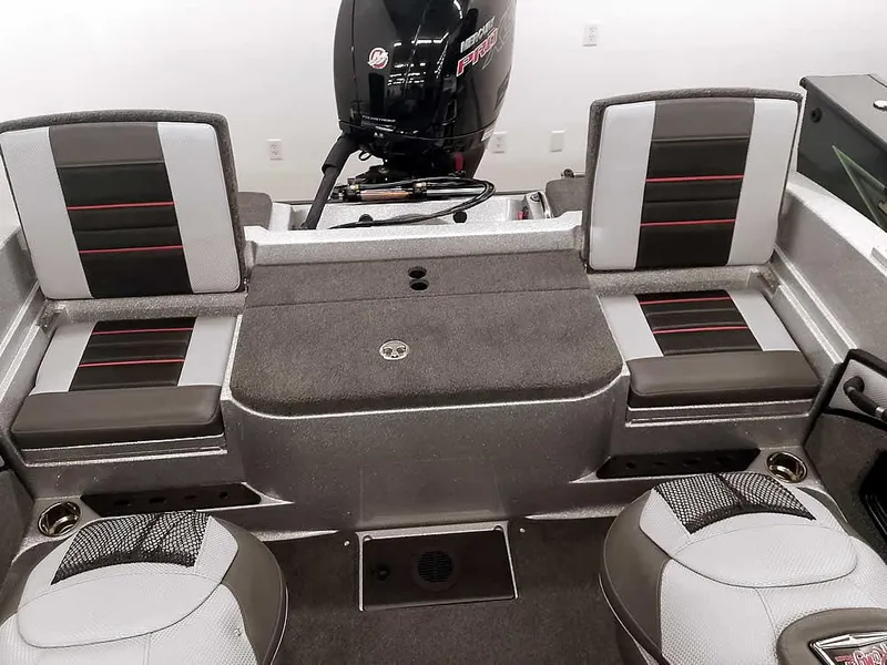 Slide: The Image of 2025 Ranger 1880MS Angler boat interior with seating and motor. - 32