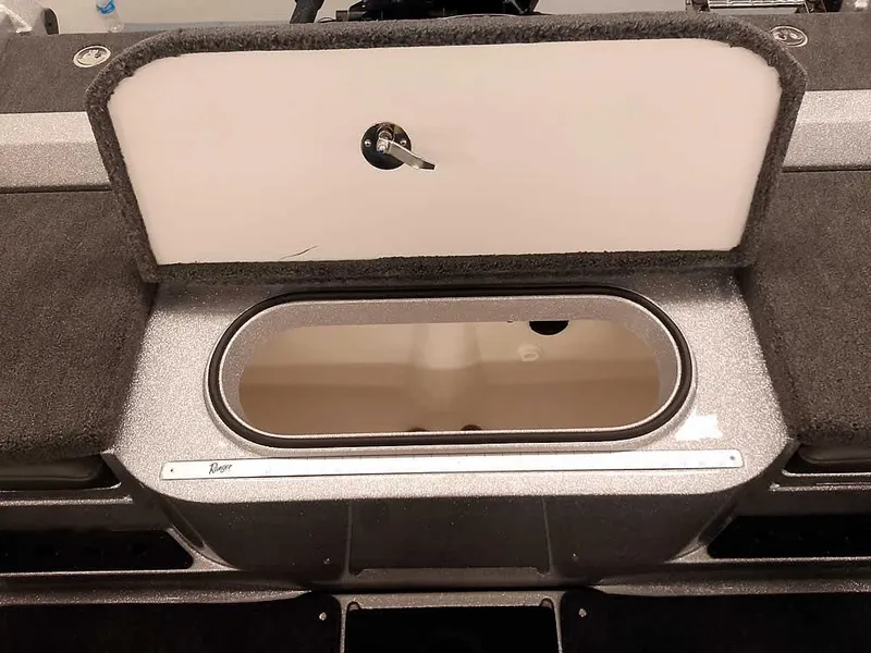 Slide: The Image of 2025 Ranger 1880MS Angler boat storage compartment with open lid. - 35