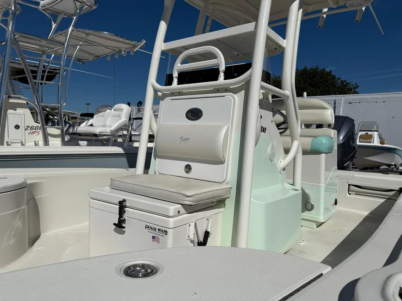 Slide: The Image of 2014 Ranger 2310 Bay boat interior with seating and storage compartments. - 3