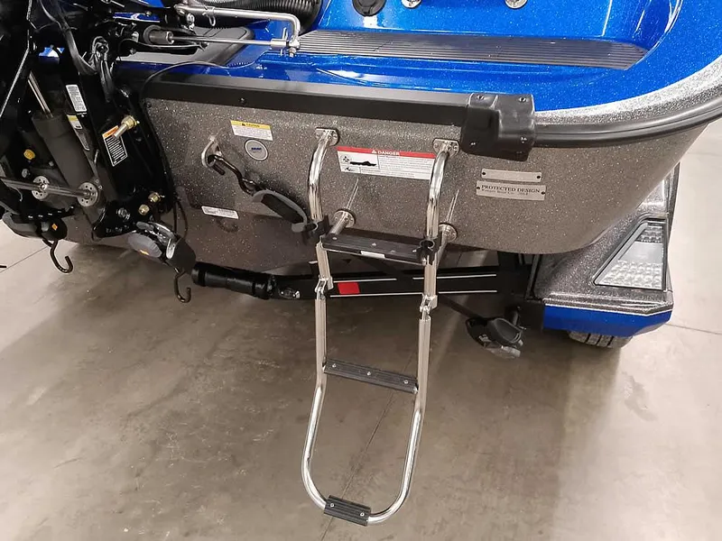 Slide: The Image of 2025 Ranger 620FS Fisherman boat with a foldable ladder and metallic finish. - 10