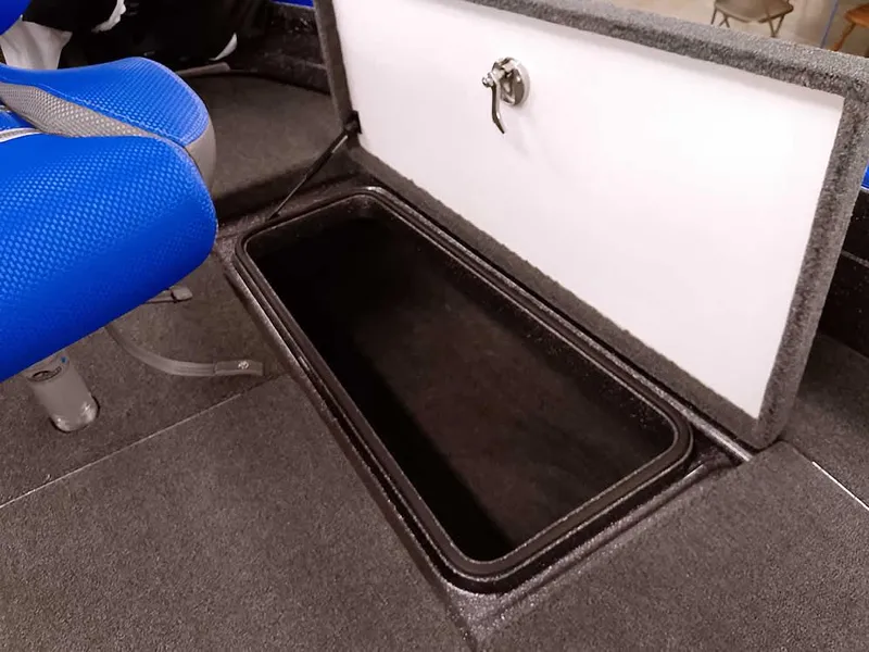 Slide: The Image of Storage compartment in 2025 Ranger 620FS Fisherman boat with blue seating. - 14