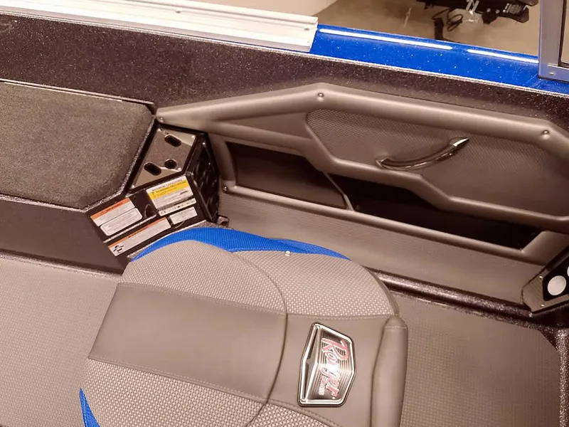 Slide: The Image of Interior of 2025 Ranger 620FS Fisherman boat with seating and storage area. - 21