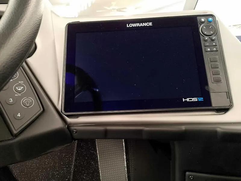 Slide: The Image of Lowrance HDS-12 fishfinder on 2025 Ranger 620FS Fisherman boat dashboard. - 26
