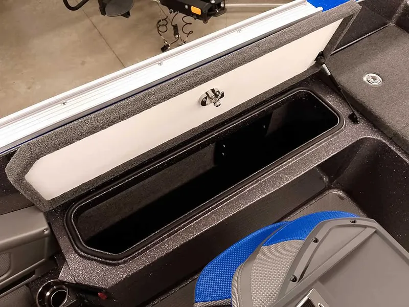 Slide: The Image of 2025 Ranger 620FS Fisherman boat storage compartment, open lid, interior view. - 27