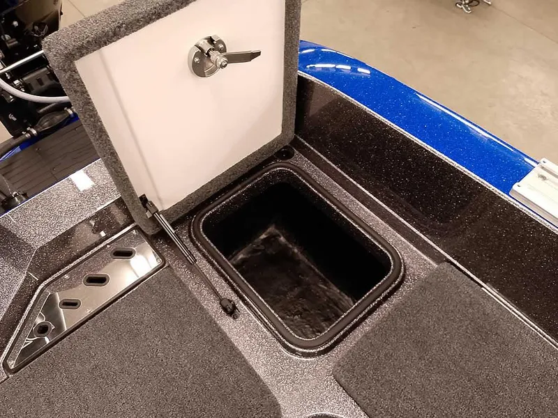 Slide: The Image of 2025 Ranger 620FS Fisherman boat storage compartment with open hatch, showcasing interior space. - 29