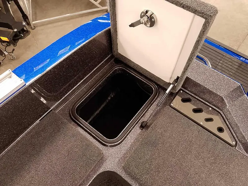 Slide: The Image of 2025 Ranger 620FS Fisherman boat storage compartment with open hatch. - 31