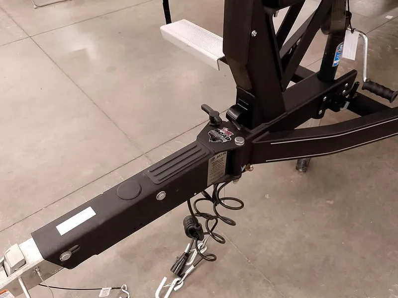 Slide: The Image of Trailer hitch of a 2025 Ranger 620FS Fisherman boat on display. - 5