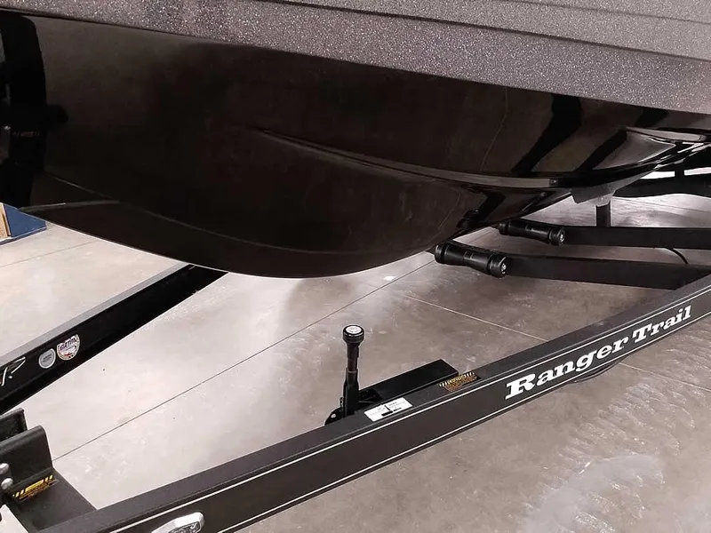 Slide: The Image of 2025 Ranger 620FS Fisherman boat on Ranger Trail trailer, close-up view. - 6