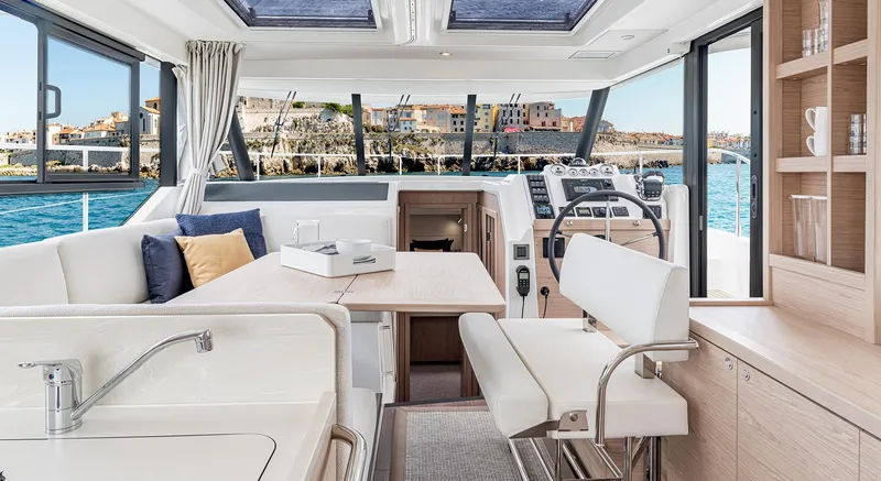 Slide: The Image of Interior of 2026 Beneteau Swift Trawler 41 Fly, featuring modern design and spacious seating. - 5