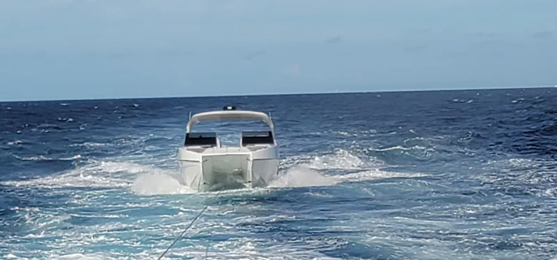 Slide: The Image of 2022 Catamaran PRJ Cat40 cruising on open sea, rear view. - 18