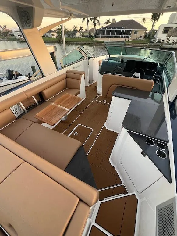 Slide: The Image of 2023 Aviara AV32 OB boat interior with luxurious seating and modern design. - 3