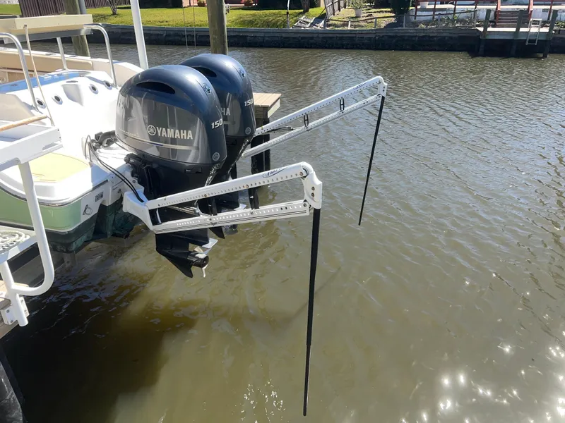 Slide: The Image of Sea Fox 266 Commander 2016 with dual Yamaha outboard motors on a calm waterway. - 28